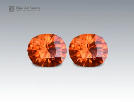 Natural 3.15 carat spessartine garnet pair with oval cut from Madagascar, fiery orange gemstones ideal for earrings, rings, or fine jewelry