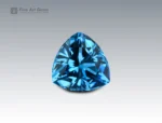 Natural 32.25 carat blue topaz trilliant cut gemstone from Brazil, vivid sky-blue gem ideal for rings, pendants, or fine jewelry