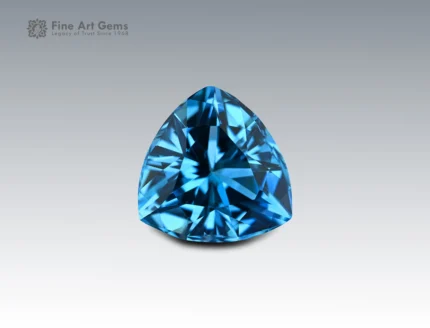 Natural 32.25 carat blue topaz trilliant cut gemstone from Brazil, vivid sky-blue gem ideal for rings, pendants, or fine jewelry