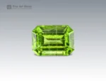 natural 12.45 carat peridot with ludwigite inclusions, emerald cut gemstone from Pakistan for ring, pendant, earrings, and jewelry collection