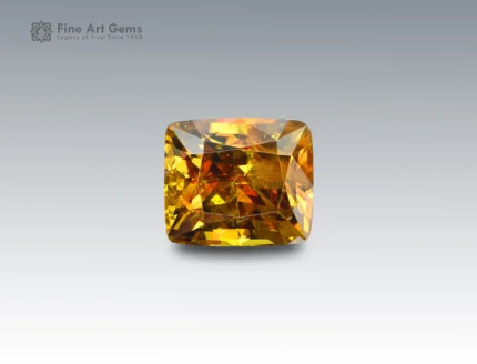 Natural 6.4 carat sphene cushion cut gemstone from Pakistan, golden orange titanite with fiery brilliance, ideal for rings or pendants