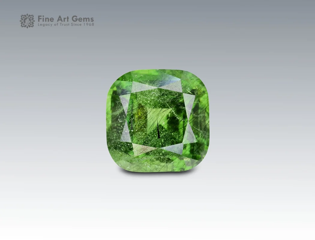 Natural 11.85 carat peridot with ludwigite inclusions cushion cut gemstone from Pakistan for ring, pendant, earrings, and jewelry collection