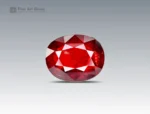 14.4 carat vivid red tantalite gemstone in oval cut from Afghanistan, faceted gem displayed on neutral background
