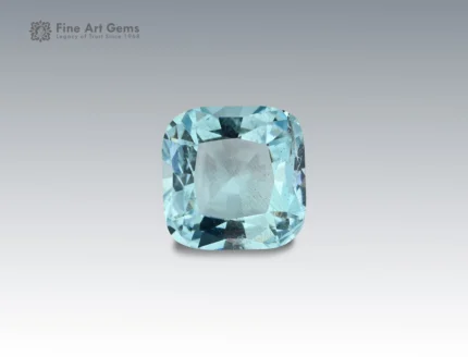 3.5 carat aquamarine gemstone in cushion cut from Madagascar, light blue faceted gem on neutral background