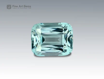 4.25 carat aquamarine gemstone in cushion cut from Madagascar, light blue faceted gem on neutral background