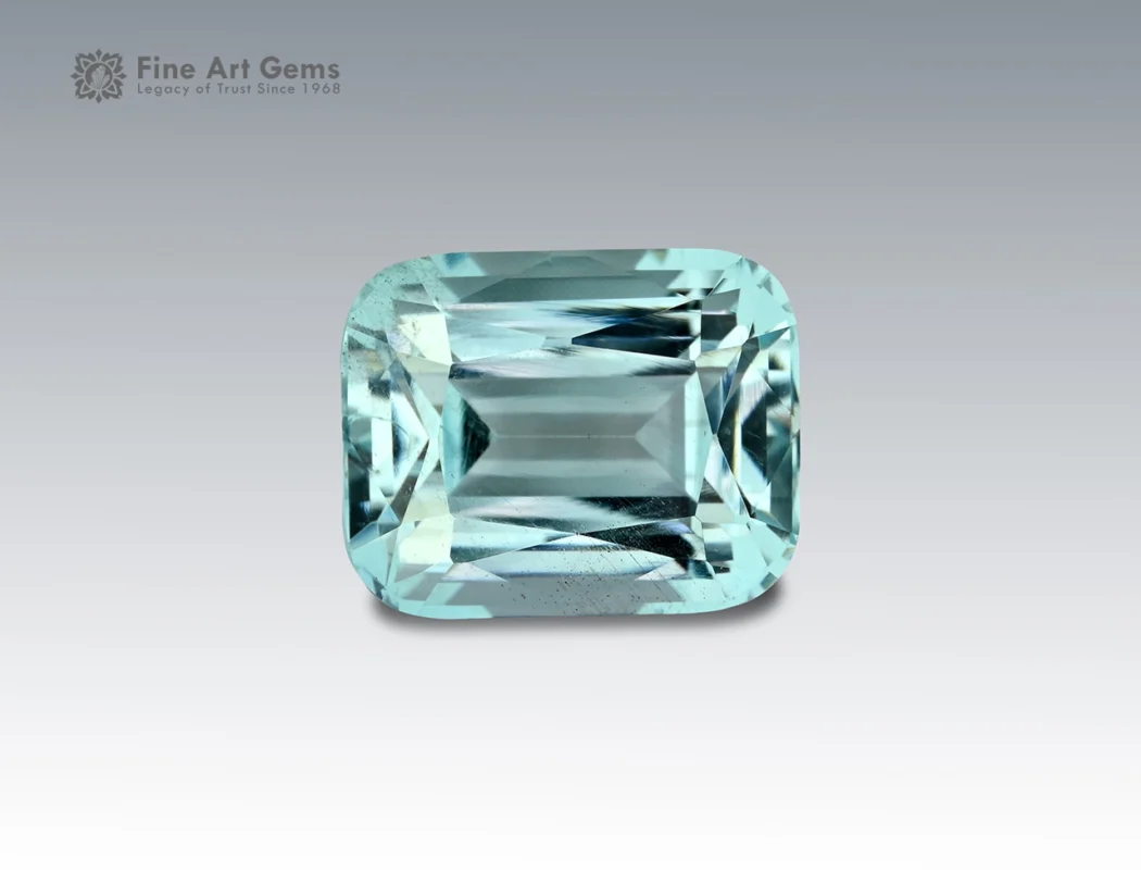 4.25 carat aquamarine gemstone in cushion cut from Madagascar, light blue faceted gem on neutral background
