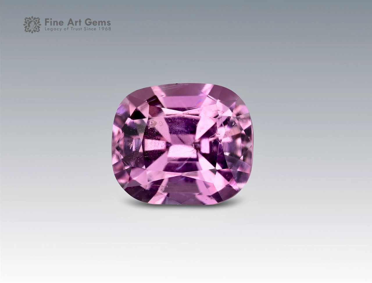1.95 carat pink topaz with cushion cut Pakistan display 1.95 carat cushion-cut natural pink topaz gemstone from Pakistan with vibrant luster