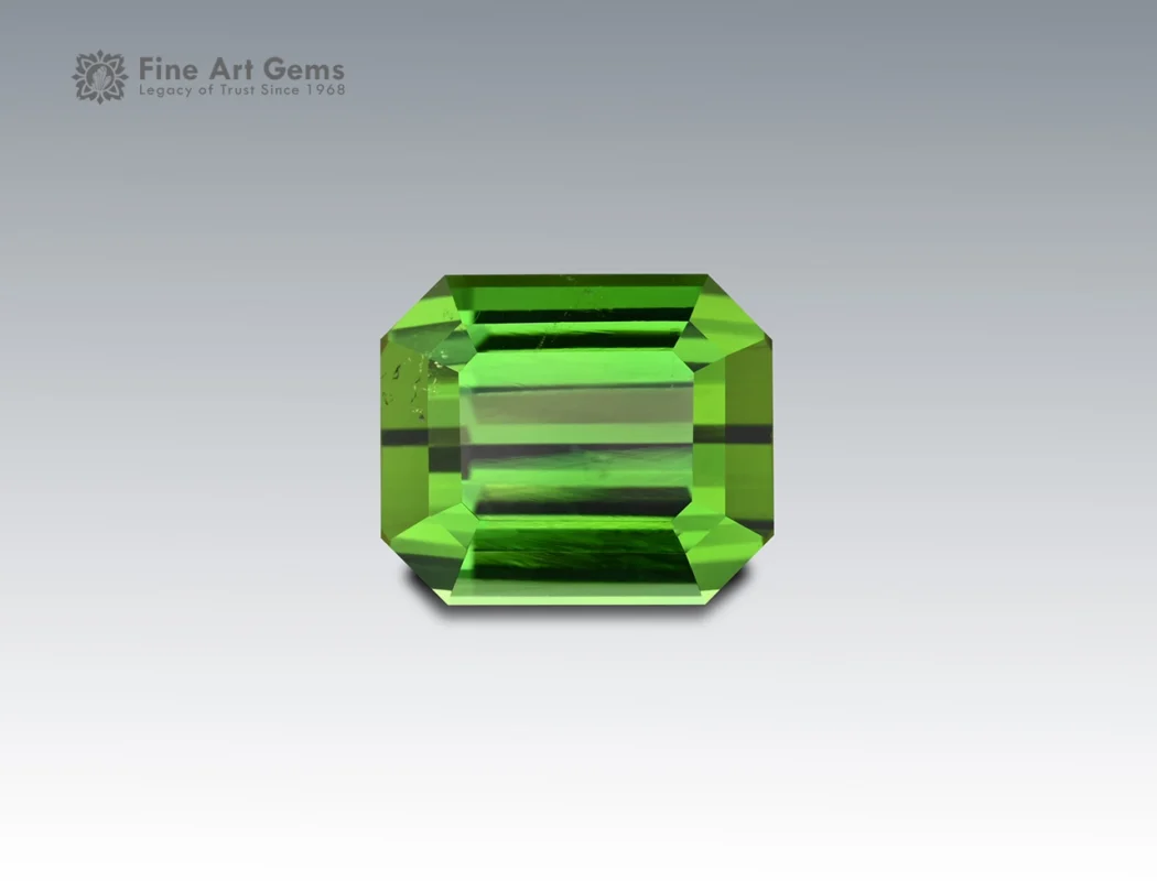 Natural 11.3 carat green tourmaline gemstone with emerald cut from Afghanistan, showcasing vivid color and clarity