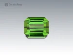 Natural 11.3 carat green tourmaline gemstone with emerald cut from Afghanistan, showcasing vivid color and clarity