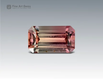 .1 carat Afghan tourmaline gemstone with emerald cut and soft pink-brown tones.