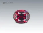 2.5 carat oval-cut rhodolite garnet with deep raspberry-red color from Africa.