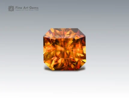2.55 carat sphene (titanite) from Pakistan with asscher cut, glowing with golden-orange fire.