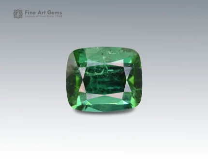 3.3 carat emerald-cut green tourmaline gemstone from Afghanistan, perfect for fine jewelry such as a ring, pendant, or luxury collection.