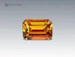 3.35 carat sphene (titanite) gemstone from Pakistan with emerald cut, golden-yellow brilliance and fire.