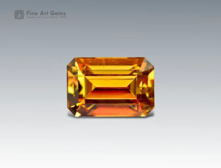 3.35 carat sphene (titanite) gemstone from Pakistan with emerald cut, golden-yellow brilliance and fire.