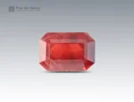 3.85 carat rhodolite garnet in emerald cut from Africa, deep red gemstone displayed on neutral background