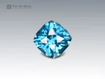 3.9 carat cushion-cut blue zircon gemstone from Cambodia, prized for its brilliance and ideal for rings, pendants, and fine jewelry collections.