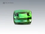 7.3 carat cushion cut green tourmaline gemstone from Afghanistan, perfect for fine jewelry such as rings, pendants, and luxury collections