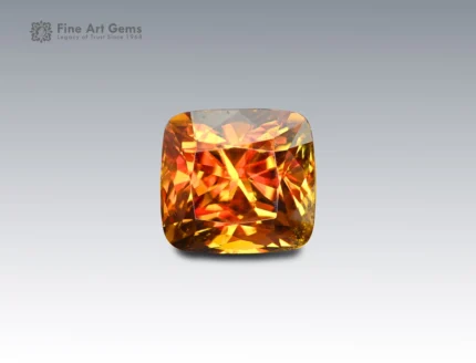 7.6 carat sphene (titanite) gemstone from Pakistan with cushion cut, showing golden-orange brilliance and fire.