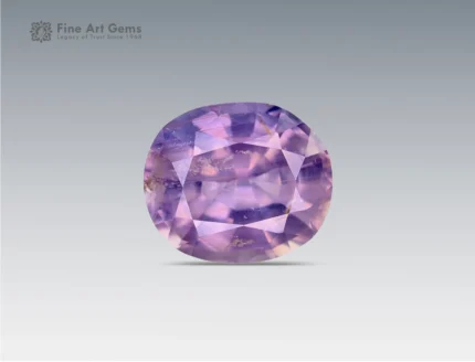 A 1.65 carat oval-cut Lavender Sapphire from Nigeria with soft violet hues, perfect for jewelry.