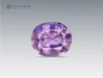 A 1.65 carat oval-cut Lavender Sapphire from Nigeria with soft violet hues, perfect for jewelry.