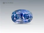 A 2.3 carat oval-cut Parti Sapphire from Nigeria with blue and violet color zoning, perfect for jewelry.