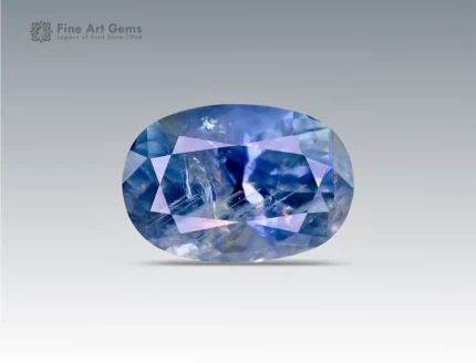 A 2.3 carat oval-cut Parti Sapphire from Nigeria with blue and violet color zoning, perfect for jewelry.