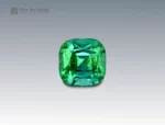 A 0.8 carat cushion-cut green Tourmaline from Afghanistan with vivid color and fine clarity, perfect for jewelry.