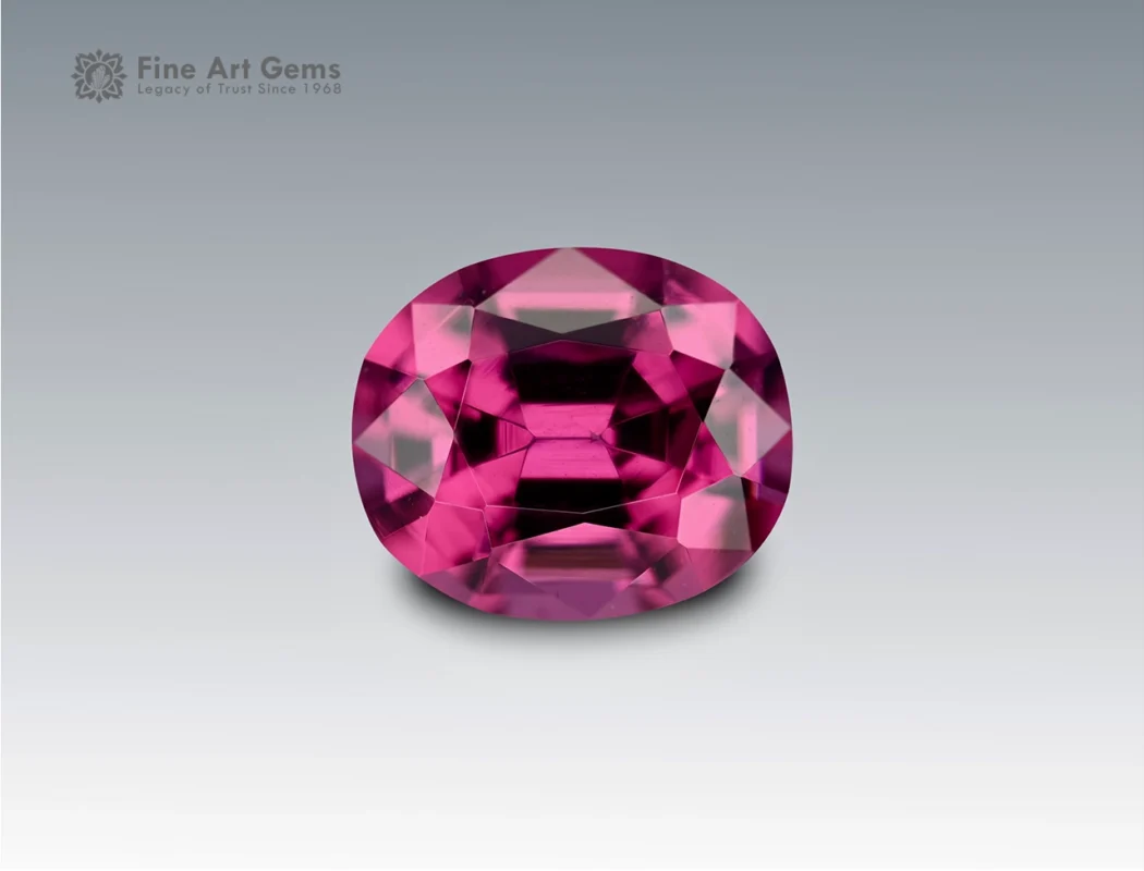 Natural 1.1 carat oval cut rhodolite garnet with rich pinkish-red brilliance, sourced from Africa. Perfect for elegant fine jewelry.