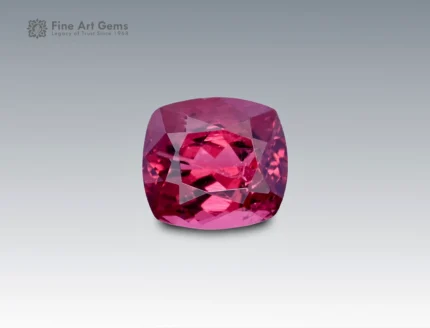 Vivid 1.1 carat rhodolite garnet in cushion cut, sourced from Africa, displaying radiant raspberry-pink hues with fine brilliance and clarity.