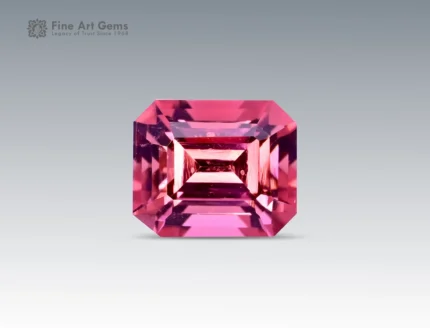 Brilliant 1.15 carat emerald cut pink tourmaline gemstone with vibrant color and fine clarity, ethically sourced from Afghanistan.