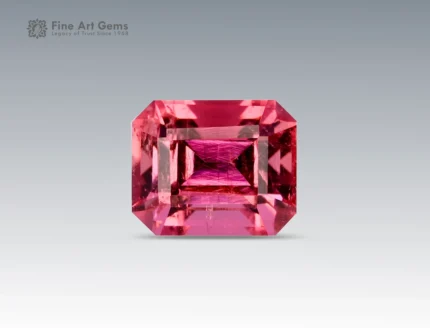 Brilliant 1.2 carat emerald cut pink tourmaline gemstone with vivid color and excellent clarity, sourced from Afghanistan.