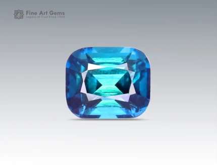 A 1.35 carat cushion-cut blue Tourmaline from Afghanistan with vivid teal-blue color and fine brilliance, perfect for jewelry.