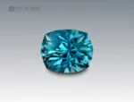 Natural 2.45 carat cushion cut blue zircon gemstone from Cambodia with exceptional sparkle, fine clarity, and vibrant brilliance.
