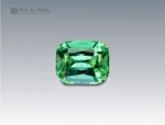Brilliant 2.7 carat cushion-cut tourmaline from Afghanistan, radiating vivid green hues with excellent brilliance and fine clarity.