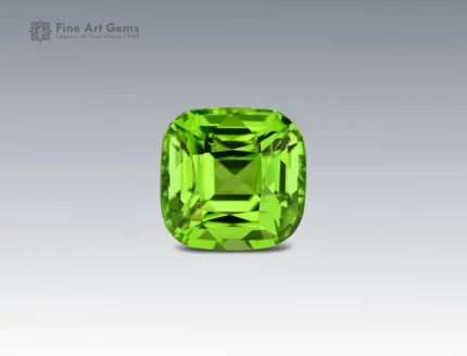 Natural 2.85 carat cushion cut peridot gemstone with vibrant green brilliance, sourced from Pakistan. Perfect for fine jewelry and gemstone collectors.