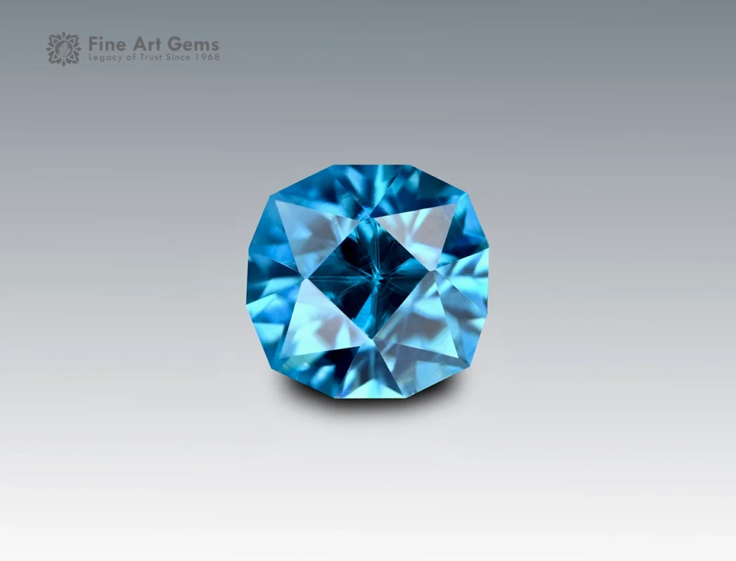 Natural 2.9 carat fancy cushion cut blue zircon gemstone from Cambodia with vivid brilliance, fine clarity, and unique faceting.