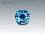 Natural 2.9 carat fancy cushion cut blue zircon gemstone from Cambodia with vivid brilliance, fine clarity, and unique faceting.