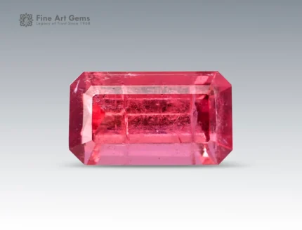 Natural 3.6 carat emerald cut pink tourmaline gemstone from Afghanistan with vivid color and strong brilliance. Perfect for fine jewelry and gemstone collectors.