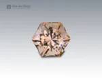 Rare 35.65 carat topaz gemstone with custom fancy hexagonal cut, showcasing champagne brilliance and fine clarity. Sourced from Pakistan.
