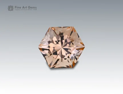 Rare 35.65 carat topaz gemstone with custom fancy hexagonal cut, showcasing champagne brilliance and fine clarity. Sourced from Pakistan.