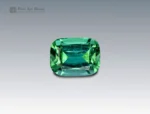 Vivid 4.35 carat cushion-cut tourmaline from Afghanistan, showcasing brilliant green hues, fine clarity, and exceptional brilliance.