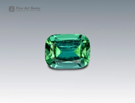 Vivid 4.35 carat cushion-cut tourmaline from Afghanistan, showcasing brilliant green hues, fine clarity, and exceptional brilliance.