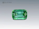 A 4.5 carat cushion-cut green Tourmaline from Afghanistan with rich color and brilliance, ideal for fine jewelry.
