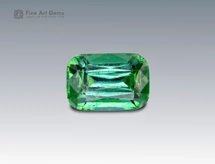 A 4.5 carat cushion-cut green Tourmaline from Afghanistan with rich color and brilliance, ideal for fine jewelry.