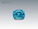 A 4.5 carat cushion-cut Zircon from Cambodia with vivid sky-blue brilliance, perfect for jewelry.