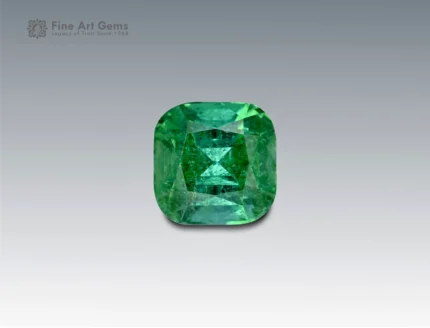 Exquisite 4.55 carat cushion-cut tourmaline from Afghanistan, displaying rich green tones with natural inclusions and radiant brilliance.