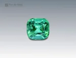 Exquisite 5 carat cushion-cut tourmaline from Afghanistan, showcasing vivid green hues with natural inclusions and radiant brilliance.