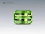 Rare 5.3 carat pixel cut peridot gemstone with ludwigite inclusions, showcasing vivid green brilliance. Sourced from Pakistan, perfect for collectors and jewelry.