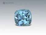 Brilliant 6.7 carat aquamarine gemstone with cushion cut, showcasing vivid ocean-blue color and fine clarity, sourced from Madagascar.